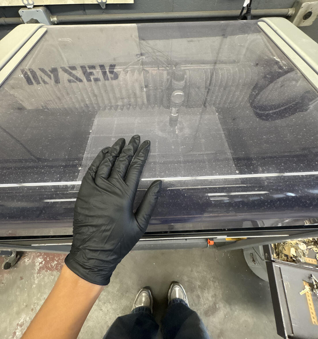 Waterjet cutting light-diffusing acrylic panels for the final sign